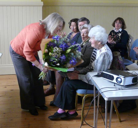Hazel Williams presenting flowers to Cynthia Graham Kerr